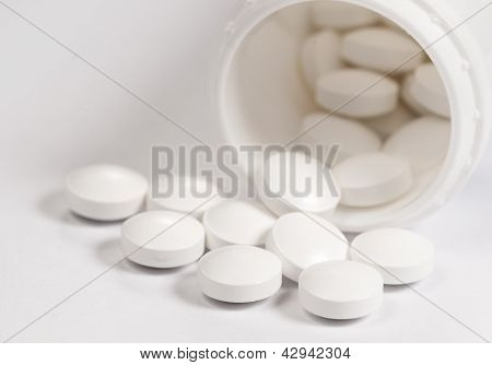 White Tablets Near The Box
