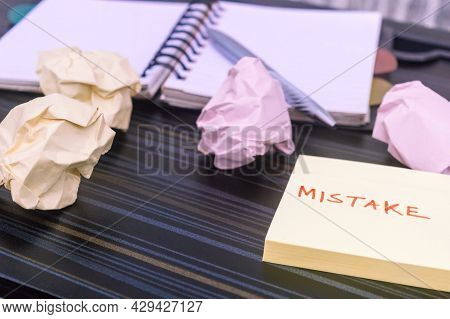 Mistake Written On Sticky Notes. Learning, Wrong, Blooper, Error Message, Regret Sayings Background.