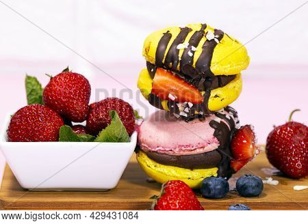 Traditional French Macaroons With Bluebarry And Strawberry. Colourful And Delicious Dessert With Cho