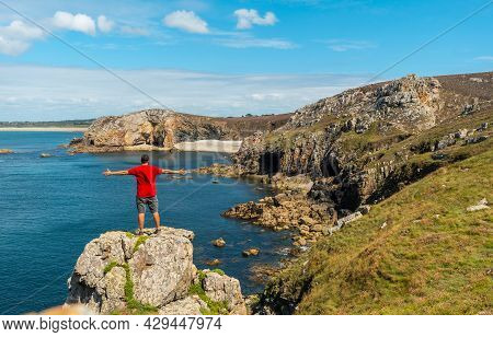 A Young Man In A Red Shirt On The Coast Enjoying The Summer At Le Chateau De Dinan On The Crozon Pen