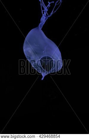 Blue Splash On Black Background To Layer, Composite And Blend With Your Own Product Images To Add Mo