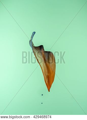 A Blue And Orange Splash On A Green Background To Layer, Composite And Blend With Your Own Product I