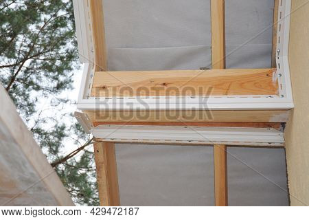 Soffit Installation In Roofing Construction. Low Angle View Of The Underside Of The Roof Eave With A