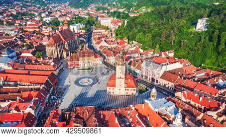 Brasov, Romania - Aerial Drone View Of Council Square With Black Church, Medieval Downtown, Transylv