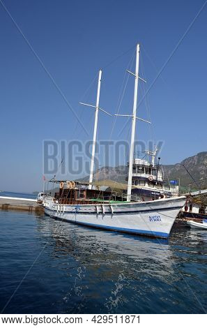 Boats and yachts at the in the marina of village  Akyaka - slow city in Turkey.August 1,2021. Mugla,Turkey