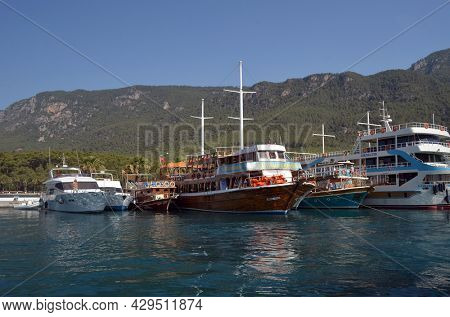 Boats and yachts at the in the marina of village  Akyaka - slow city in Turkey.August 1,2021. Mugla,Turkey