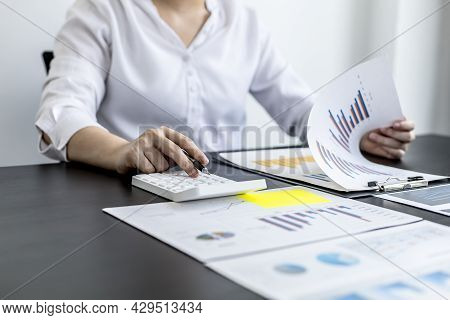 Financial Accountants Are Checking Documents From The Finance Department, Verifying Company Financia