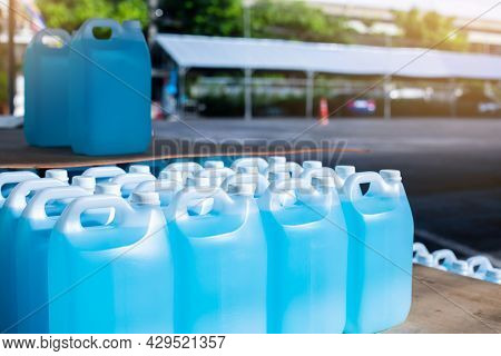 Alcohol For Cleaning And Sanitizing Is Contained In Gallons In The Warehouse. Many Gallon Alcohol Ge