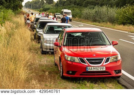 Chernihiv, Ukraine - July 24, 2021: Saab Cars And People On The Road. Saab 9-3 And Saab 9-5 Against 