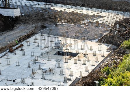 Closeup Of House Foundation Made From Concrete Shuttering Blocks Filled With Mortar And Reinforcemen
