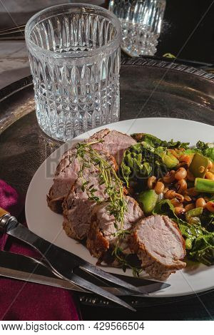 Roasted Pork Tenderloin With Collard Green Black Eyed Pea Salad