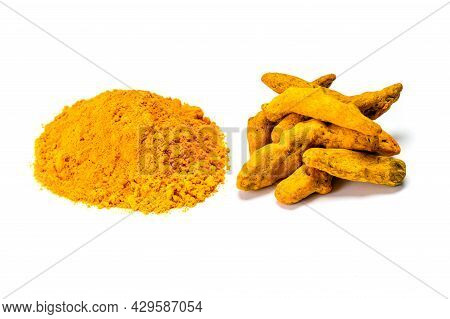 Turmeric Rhizome And Powder On White Background