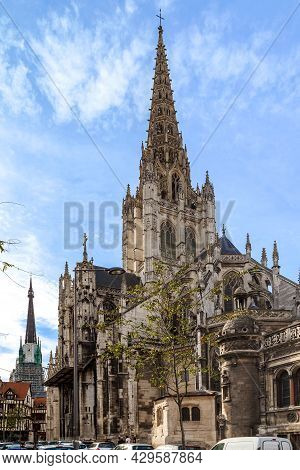 Rouen, France - August 31, 2019: This Is The Gothic Medieval Church Of Saint Maclou And The Spire Of