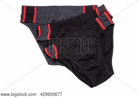 Underware Isolated. Close-up Of Two Black And One Gray Male Underware Or Underpant Isolated On A Whi