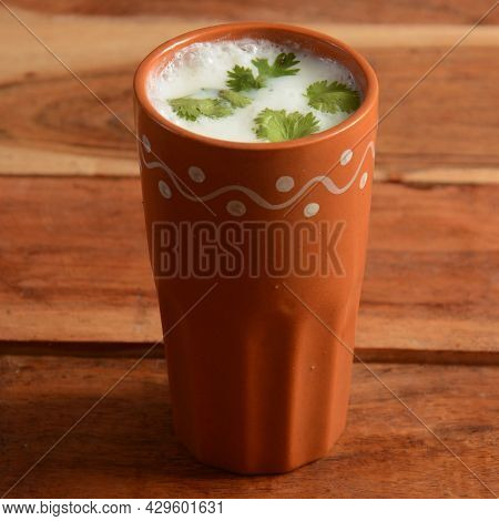 Summer Cooler Buttermilk Drink. Made Of Yogurt. Served In A Traditional Clay Pot, Selective Focus On