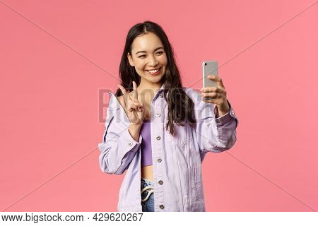 Online Lifestyle, People And Beauty Concept. Stylish Pretty Korean Girl Talking To Friend Online Vid