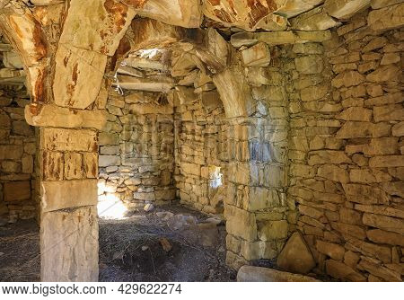 The Interior Of The Dwelling With Pillars Supporting Ceiling In Historical Abandoned Village Of Gams