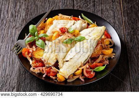 Iitalian Poached Fish, Acqua Pazza, In A Tomato And White Wine Based Sauce With Fennel, Herbs And Cr