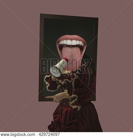 Model Like Medieval Royalty Person In Vintage Clothing Shouting In Megaphone. Concept Of Comparison 