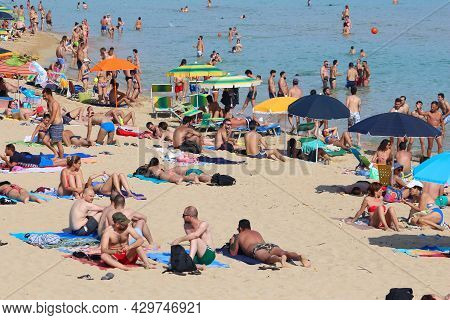 Salento, Italy - June 2, 2017: People Visit Maldives Di Pescoluse Beach In Salento Peninsula, Italy.