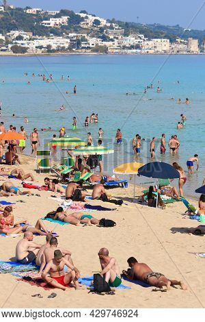Salento, Italy - June 2, 2017: People Visit Maldives Di Pescoluse Beach In Salento Peninsula, Italy.
