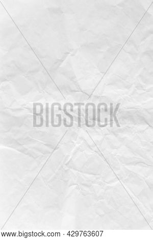 Crumpled white paper textured background