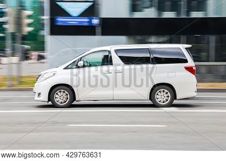 Toyota Alphard 350g Driving Along The Street In City With Blurred Background. Moscow, Russia - April