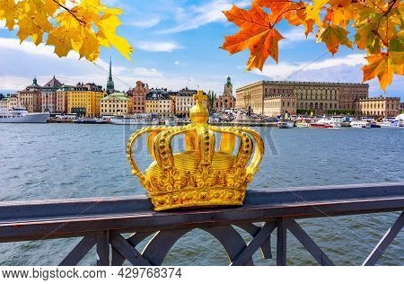 Stockholm Old Town (gamla Stan) Cityscape And Royal Crown In Autumn, Sweden