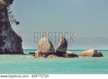 Split Apple Rock in New Zealand coast