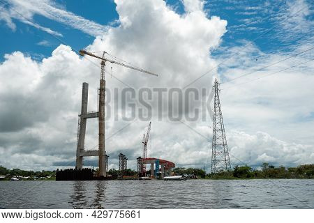 Peru, Amazon, Iquitos. The Nanay Bridge Is A Bridge Under Construction, Located In The Center Of The