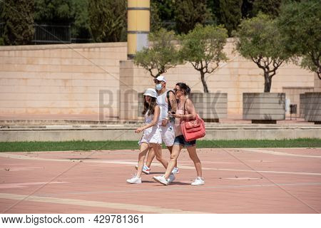 Barcelona, Spain; August 12 2021: Tourists Walking In Montjuic Olympic Stadium, Built In 1927 In Cov