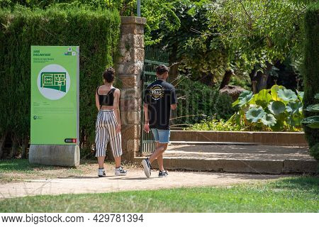 Barcelona, Spain; August 12 2021: Young Couple In The Jardi D Aclimatacio En Montjuic En Barcelona, 