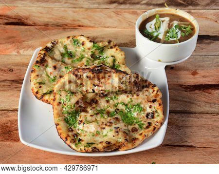 Chole Kulcha, Clay Baked Stuffed Naan Served With Channa Masala Or Chole Masala, Typical Meal Of Amr