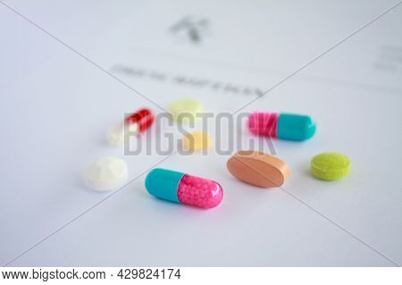 Many Medicine Pills On A Prescription Form
