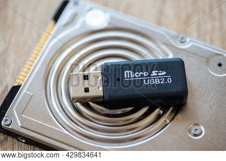 Close-up Of A Micro Sd To Sd Adapter On A Hard Disk, Usb Pen