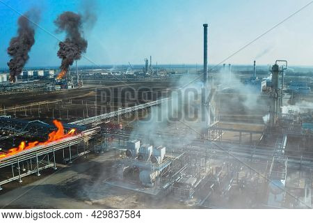Collage. Fire At The Refinery. Flames And Smoke Of Fire.