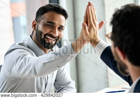Indian Happy Smiling Multiracial Professional Ceo Businessman Giving Highfive To Business Partner Af