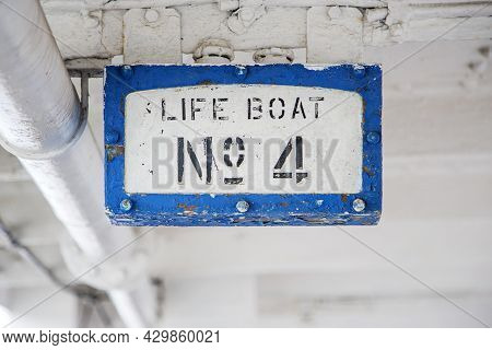 Life boat sign on vintage ship