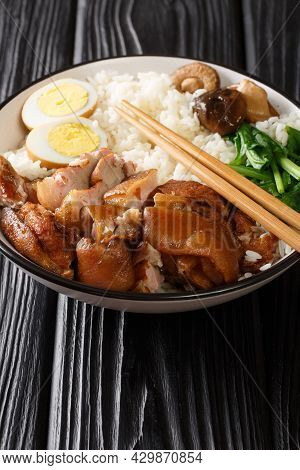 Chinese Thai Food Khao Kha Moo Jasmine Rice With Stewed Pork Leg Boiled Eggs, Mushrooms Closeup In T