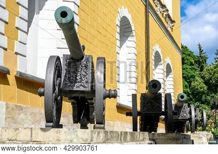 Cannons Inside Moscow Kremlin, Russia. This Place Is Famous Tourist Attraction Of Moscow. Old Ornate