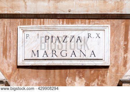 Street Name Piazza Margana - Engl: Margana Square -  Painted At The Wall In Rome Italy