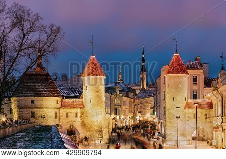 Tallinn, Estonia. Famous Landmark Viru Gate In Street Lighting At Evening Or Night Illumination. Chr