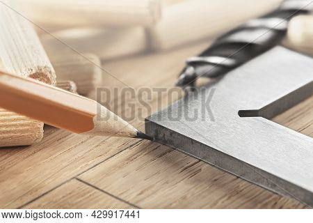 Pencil, Steel Ruler Drawing On Wooden Oak Board For Drilling Holes
