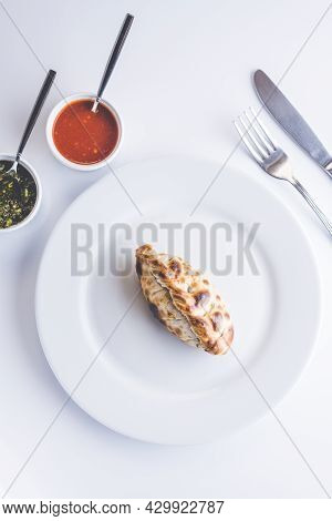 Traditional Argentinian Food Called Empanada On A White Background