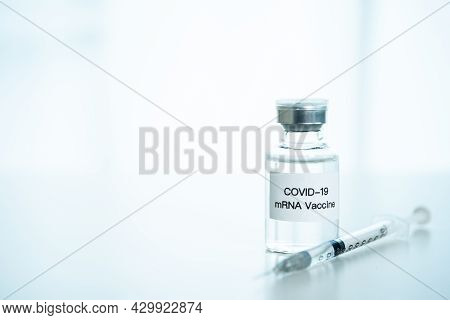Coronavirus 2019 Or Sars 2019-ncov Cure Vaccine In Mrna Technology And Medical Needle Close Up. Mrna