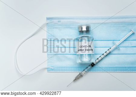 Coronavirus 2019 Or Sars 2019-ncov Cure Vaccine In Mrna Technology And Medical Needle Close Up. Mrna