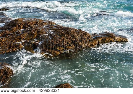 Waves Breaking On The Rocks Of Ponta Do Humaitá.