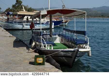 Boats and yachts at the in the marina of village Akyaka - slow city in Turkey.August 1,2021. Mugla,Turkey