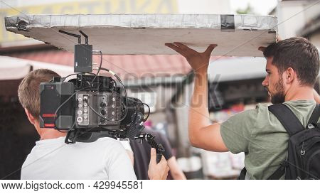 Behind Scenes. Film Crew Team Shooting Movie Scene. Group Filmmaking