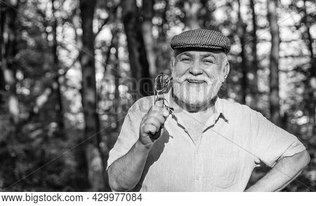 Eye Care. Happy Pensioner Hold Glasses In Nature. Old Man Have Long Sight. Old Age Sight. Failing Si